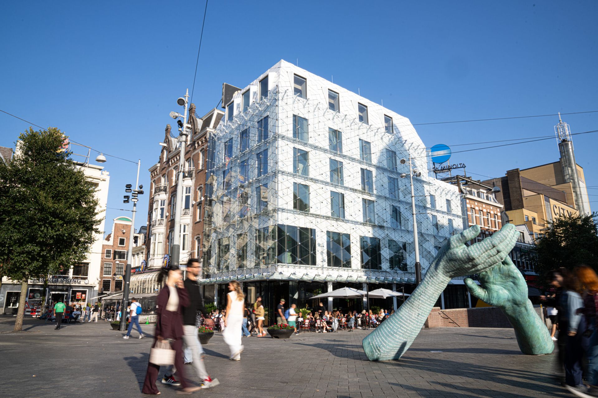 Hotel The Diamond on the corner of Leidseplein, home of Heineken Hoek, with its terrace and people crossing the square